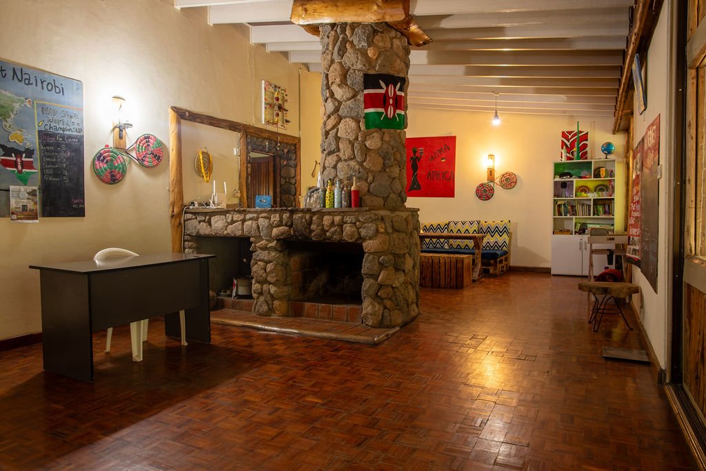 Mad Vervet Nairobi lounge with stone fireplace